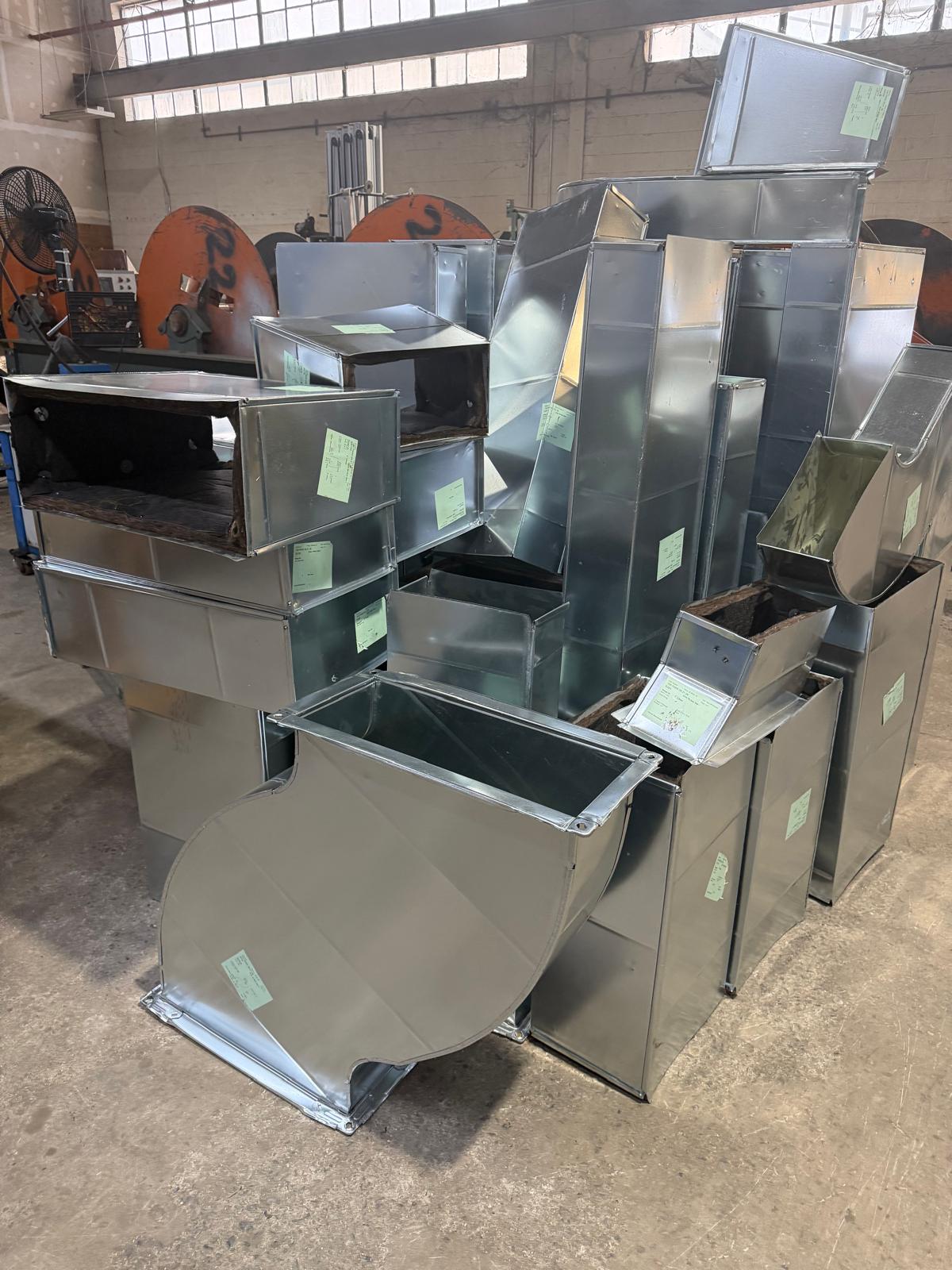 Assorted rectangular ductwork and custom fittings in the fabrication shop