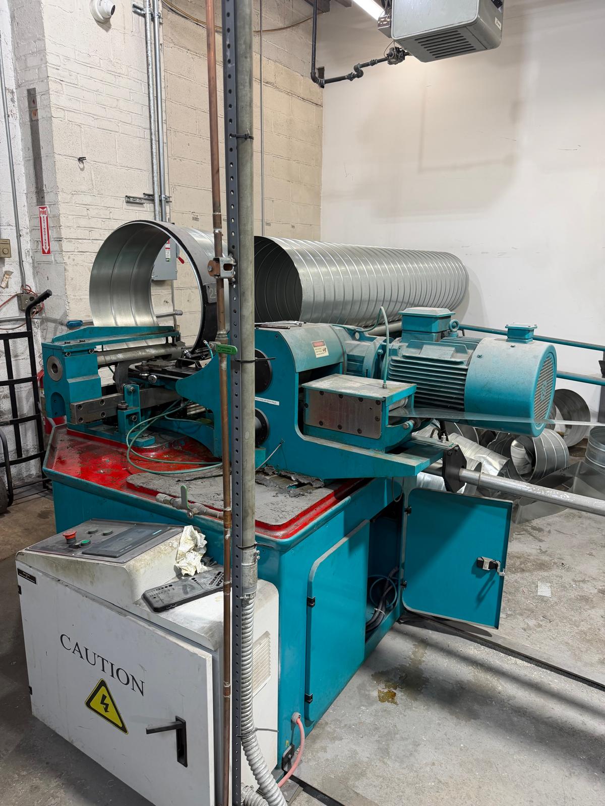 Spiral duct exiting the forming machine